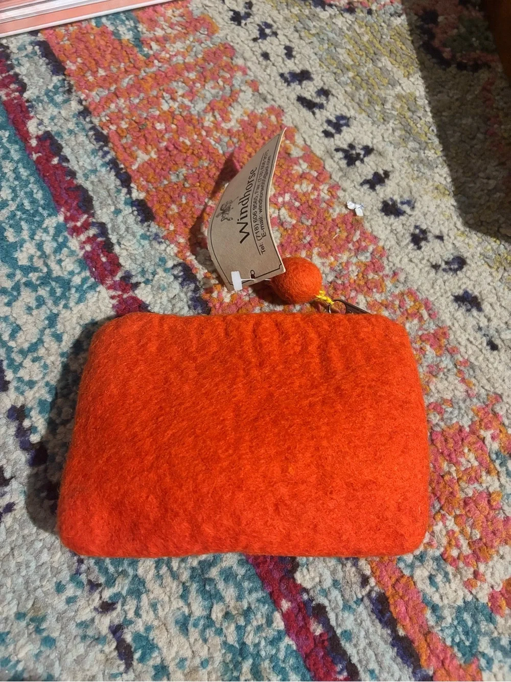 Windhorse Orange Felt Wristlet with Green Floral Applique